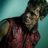 Boy Kills World 2024 Bill Skarsgard Red Vest